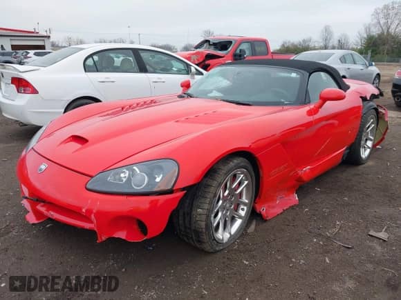 2005 Dodge Viper SRT-10 with VIN 1B3JZ65Z25V500516, listed as a IAAI auction lot 42000783 with 13,090 mi miles and . Bid and sale history available at DreamBid. Image 2.
