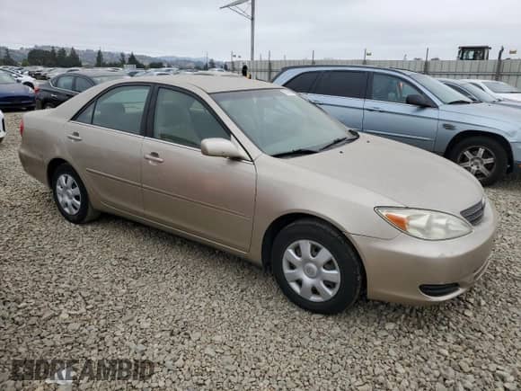 2002 Toyota Camry LE z VIN JTDBE32K920035830, wystawiony jako Copart lot #70140505 z przebiegiem 184 600 mil mil oraz Szkoda całkowita • Salvage title. Historia ofert i sprzedaży dostępna na DreamBid. Obrazek 4.