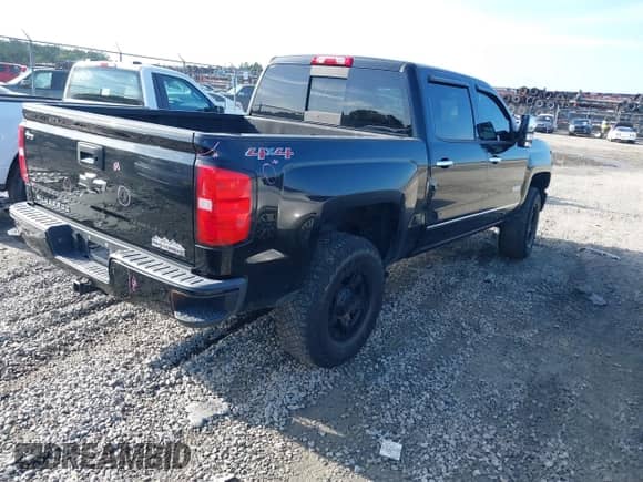 2014 Chevrolet Silverado 1500 High Country with VIN 3GCUKTEC7EG272127, listed as a IAAI auction lot 42465267 with 190,924 mi miles and . Bid and sale history available at DreamBid. Image 4.