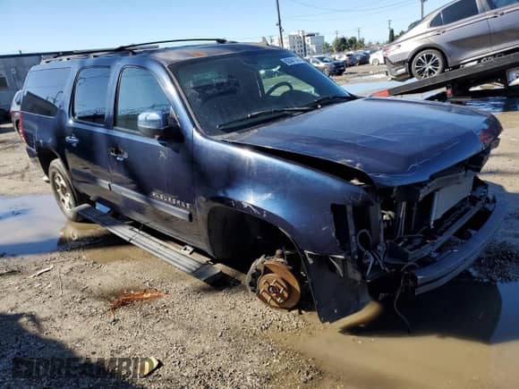 2007 Chevrolet Suburban LTZ z VIN 1GNFK16Y37R344331, wystawiony jako Copart lot #82441145 z przebiegiem Nie podano mil oraz Szkoda całkowita • Salvage title. Historia ofert i sprzedaży dostępna na DreamBid. Obrazek 4.
