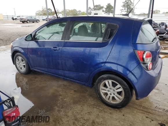 2014 Chevrolet Sonic LT с VIN 1G1JC6SBXE4185129, выставлен на аукционе Copart как лот 50242585 с пробегом 90 905 миль миль и Чистый • Clean title. История ставок и продаж доступна на DreamBid. Изображение 2.