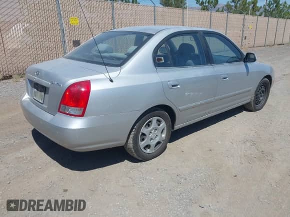 2003 Hyundai Elantra GLS with VIN KMHDN45D43U674800, listed as a IAAI auction lot 42985822 with 99,091 mi miles and . Bid and sale history available at DreamBid. Image 4.