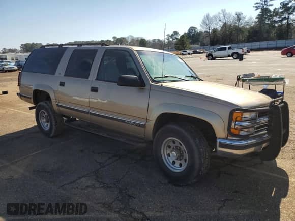 1999 Chevrolet Suburban z VIN 1GNGK26J3XJ386171, wystawiony jako Copart lot #43266315 z przebiegiem 315 589 mil mil oraz Szkoda całkowita • Salvage title. Historia ofert i sprzedaży dostępna na DreamBid. Obrazek 4.