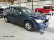 2014 Dodge Journey American Value with VIN 3C4PDCAB6ET245951, listed as a Copart auction lot 71156905 with 141,144 mi miles and Salvage title. Bid and sale history available at DreamBid. Image 4.