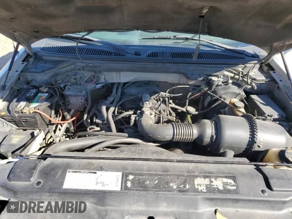 2001 Ford F-150 XL с VIN 1FTZX17231NA36253, выставлен на аукционе Copart как лот 85595575 с пробегом 203 731 миль миль и Списание • Salvage title. История ставок и продаж доступна на DreamBid. Изображение 11.