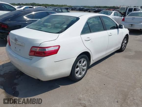 2007 Toyota Camry CE with VIN 4T1BE46K57U721326, listed as a IAAI auction lot 43234852 with 185,426 mi miles and . Bid and sale history available at DreamBid. Image 4.