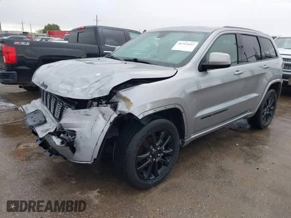 2020 Jeep Grand Cherokee Altitude with VIN 1C4RJEAG2LC392060, listed as a IAAI auction lot 40765662 with 30,505 mi miles and . Bid and sale history available at DreamBid. Image 18.