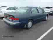 1997 Toyota Camry LE with VIN JT2BG22K3V0025263, listed as a IAAI auction lot 43310654 with 217,418 mi miles and . Bid and sale history available at DreamBid. Image 4.