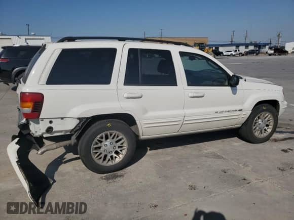 2002 Jeep Grand Cherokee Limited with VIN 1J4GX58N12C282300, listed as a Copart auction lot 74939754 with 166,018 mi miles and Salvage title. Bid and sale history available at DreamBid. Image 3.