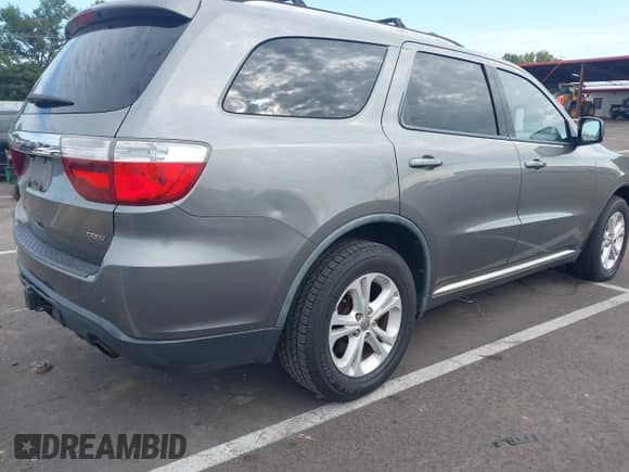 2011 Dodge Durango Crew with VIN 1D4SE4GT5BC648696, listed as a IAAI auction lot 43090313 with 260,022 mi miles and . Bid and sale history available at DreamBid. Image 4.