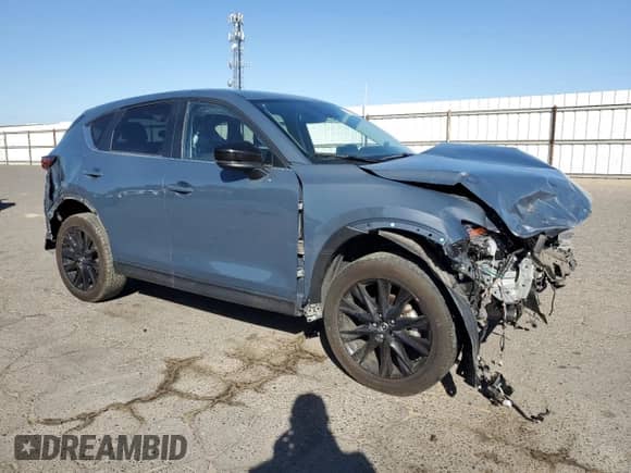2024 Mazda CX-5 S Carbon Edition z VIN JM3KFBCL2R0518222, wystawiony jako Copart lot #85533705 z przebiegiem Nie podano mil oraz Szkoda całkowita • Salvage title. Historia ofert i sprzedaży dostępna na DreamBid. Obrazek 4.