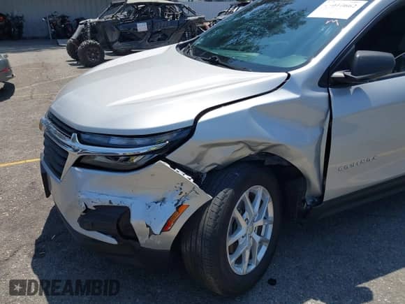 2022 Chevrolet Equinox LS z VIN 2GNAXHEV1N6102500, wystawiony jako IAAI lot #43010662 z przebiegiem 30 131 mil mil oraz . Historia ofert i sprzedaży dostępna na DreamBid. Obrazek 6.