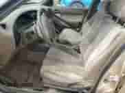 1996 Toyota Camry DX z VIN JT2BG12K4T0391773, wystawiony jako Copart lot #68545815 z przebiegiem 103 853 mil mil oraz Szkoda całkowita • Salvage title. Historia ofert i sprzedaży dostępna na DreamBid. Obrazek 7.