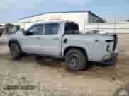 2025 Nissan Frontier Pro-X with VIN 1N6ED1EJ9SN619328, listed as a Copart auction lot 63809825 with 9,798 mi miles and Salvage title. Bid and sale history available at DreamBid. Image 2.