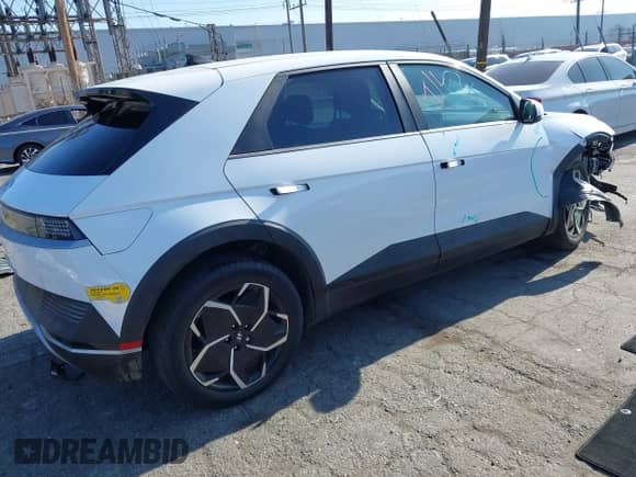 2022 Hyundai Ioniq 5 SE z VIN KM8KM4AEXNU061012, wystawiony jako IAAI lot #42363508 z przebiegiem 28 111 mil mil oraz . Historia ofert i sprzedaży dostępna na DreamBid. Obrazek 4.