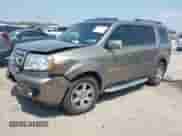 2009 Honda Pilot Touring with VIN 5FNYF38809B004142, listed as a IAAI auction lot 42337103 with 152,874 mi miles and . Bid and sale history available at DreamBid. Image 2.