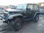 2014 Jeep Wrangler Sport z VIN 1C4AJWAG1EL327481, wystawiony jako IAAI lot #43527216 z przebiegiem 162 278 mil mil oraz . Historia ofert i sprzedaży dostępna na DreamBid. Obrazek 2.
