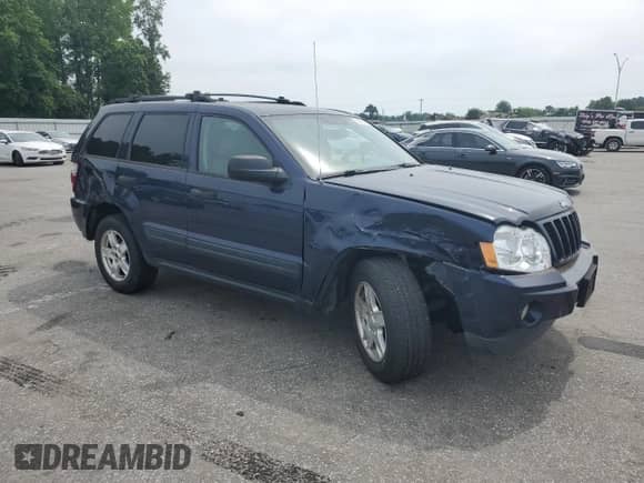 2006 Jeep Grand Cherokee Laredo with VIN 1J4HS48N56C225343, listed as a Copart auction lot 56952235 with 200,769 mi miles and Salvage title. Bid and sale history available at DreamBid. Image 4.