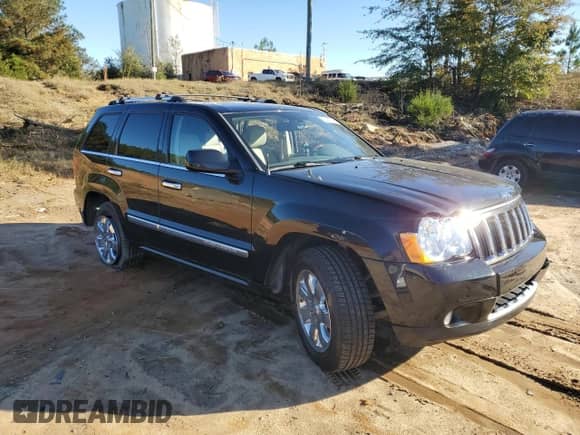 2009 Jeep Grand Cherokee with VIN 1J8HR68T19C550936, listed as a Copart auction lot 80090724 with 113,543 mi miles and Salvage title. Bid and sale history available at DreamBid. Image 4.