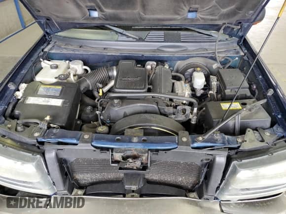 2003 Chevrolet TrailBlazer LTZ с VIN 1GNDT13S232157265, выставлен на аукционе Copart как лот 82138415 с пробегом 265 365 миль миль и Списание • Salvage title. История ставок и продаж доступна на DreamBid. Изображение 12.
