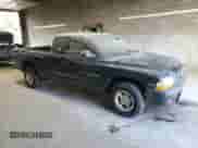 2000 Dodge Dakota with VIN 1B7GL22XXYS740988, listed as a Copart auction lot 70573985 with 61,895 mi miles and Clean title. Bid and sale history available at DreamBid. Image 4.