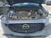 2025 Mazda CX-5 S Carbon Edition z VIN JM3KFBCM8S0646821, wystawiony jako IAAI lot #42610837 z przebiegiem Nie podano mil oraz . Historia ofert i sprzedaży dostępna na DreamBid. Obrazek 10.