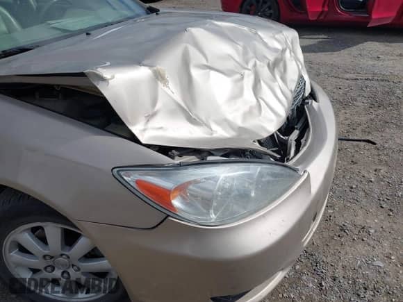 2002 Toyota Camry XLE with VIN JTDBF30K220032817, listed as a IAAI auction lot 43221406 with 108,631 mi miles and . Bid and sale history available at DreamBid. Image 12.