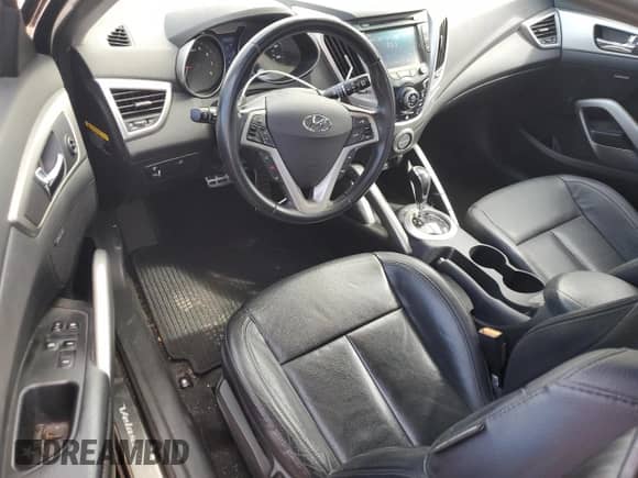 2015 Hyundai Veloster z VIN KMHTC6AD2FU220312, wystawiony jako Copart lot #65853685 z przebiegiem 46 683 mil mil oraz Szkoda całkowita • Salvage title. Historia ofert i sprzedaży dostępna na DreamBid. Obrazek 8.