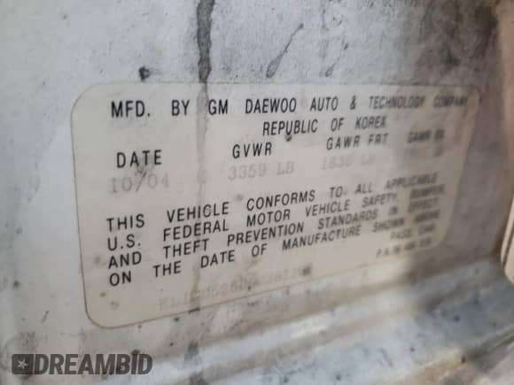 2005 Chevrolet Aveo LS z VIN KL1TD52665B331166, wystawiony jako Copart lot #79510054 z przebiegiem 165 471 mil mil oraz Szkoda całkowita • Salvage title. Historia ofert i sprzedaży dostępna na DreamBid. Obrazek 12.