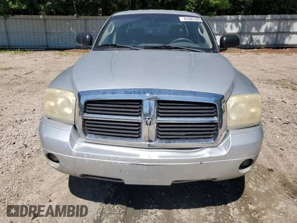 2007 Dodge Dakota SLT z VIN 1D7HE48P67S218445, wystawiony jako Copart lot #61587285 z przebiegiem 173 377 mil mil oraz Czysty tytuł • Clean title. Historia ofert i sprzedaży dostępna na DreamBid. Obrazek 5.