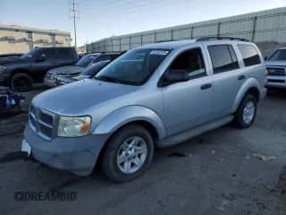 2007 Dodge Durango SXT with VIN 1D8HB38P67F565328, listed as a Copart auction lot 46153125 with 211,093 mi miles and Salvage title. Bid and sale history available at DreamBid. Image 1.