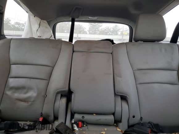 2016 Honda Pilot EX-L z VIN 5FNYF5H57GB033281, wystawiony jako Copart lot #79302384 z przebiegiem Nie podano mil oraz Szkoda całkowita • Salvage title. Historia ofert i sprzedaży dostępna na DreamBid. Obrazek 10.