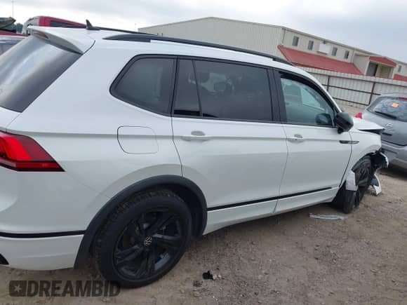 2023 Volkswagen Tiguan SE R-Line Black с VIN 3VVCB7AXXPM014458, выставлен на аукционе IAAI как лот 43084168 с пробегом 26 374 миль миль и . История ставок и продаж доступна на DreamBid. Изображение 13.