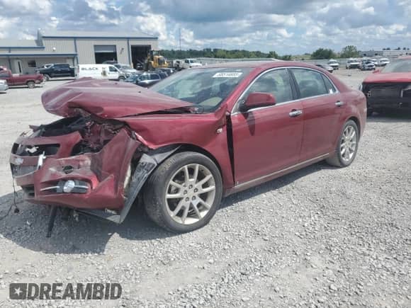 2008 Chevrolet Malibu LTZ with VIN 1G1ZK57728F255493, listed as a Copart auction lot 68514685 with 128,440 mi miles and Salvage title. Bid and sale history available at DreamBid. Image 1.