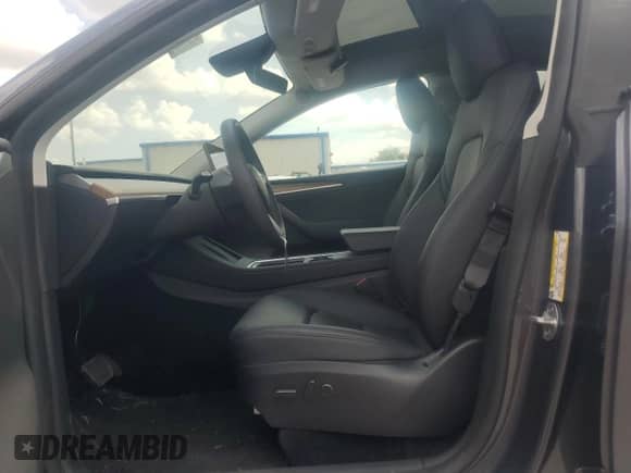 2023 Tesla Model Y with VIN 7SAYGDED6PF960648, listed as a Copart auction lot 67447254 with 18,536 mi miles and Salvage title. Bid and sale history available at DreamBid. Image 7.