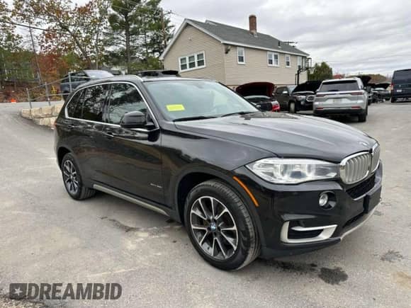 2018 BMW X5 xDrive35i z VIN 5UXKR0C55J0X97612, wystawiony jako Copart lot #90825495 z przebiegiem 219 562 mil mil oraz Czysty tytuł • Clean title. Historia ofert i sprzedaży dostępna na DreamBid. Obrazek 4.