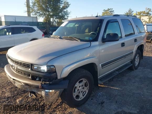 2005 Chevrolet Tahoe LS with VIN 1GNEK13T65J195414, listed as a IAAI auction lot 43409539 with 299,458 mi miles and . Bid and sale history available at DreamBid. Image 17.