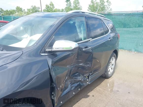 2021 Chevrolet Equinox Premier with VIN 2GNAXNEVXM6140093, listed as a IAAI auction lot 42627819 with 36,271 mi miles and . Bid and sale history available at DreamBid. Image 6.