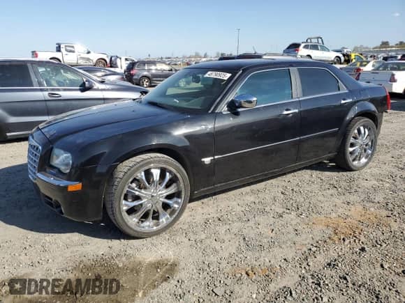 2005 Chrysler 300 300C AWD with VIN 2C3AK63H55H672324, listed as a Copart auction lot 48790925 with 258,543 mi miles and Salvage title. Bid and sale history available at DreamBid. Image 1.