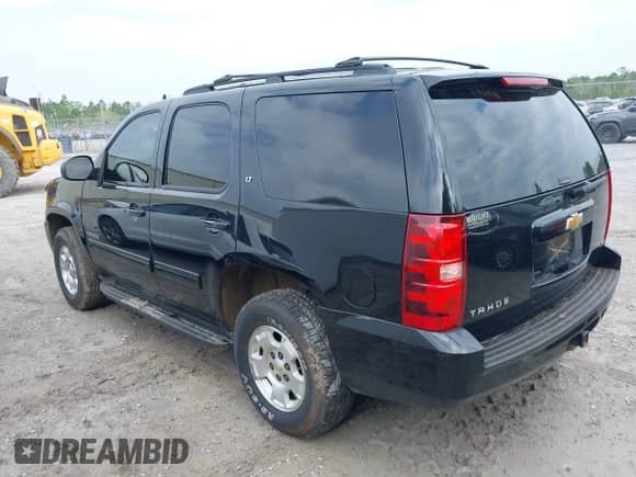 2012 Chevrolet Tahoe LT with VIN 1GNSCBE09CR222631, listed as a IAAI auction lot 41889997 with 166,138 mi miles and . Bid and sale history available at DreamBid. Image 3.