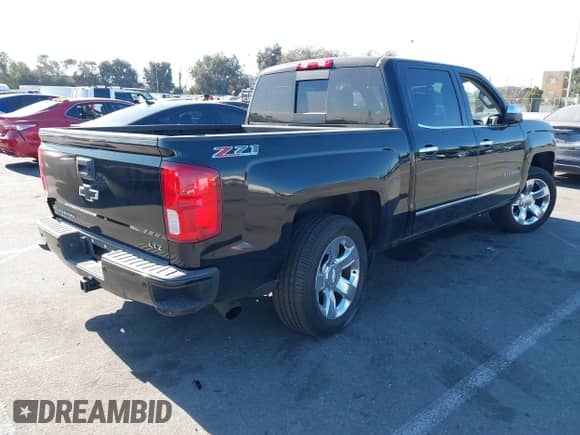 2017 Chevrolet Silverado 1500 LTZ z VIN 3GCUKSEC2HG276942, wystawiony jako IAAI lot #41360042 z przebiegiem 89 751 mil mil oraz . Historia ofert i sprzedaży dostępna na DreamBid. Obrazek 4.