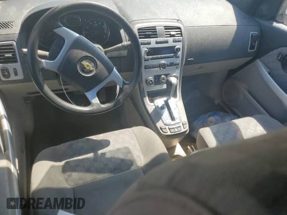 2007 Chevrolet Equinox LS z VIN 2CNDL13FX76251457, wystawiony jako Copart lot #69228584 z przebiegiem Nie podano mil oraz Szkoda całkowita • Salvage title. Historia ofert i sprzedaży dostępna na DreamBid. Obrazek 8.