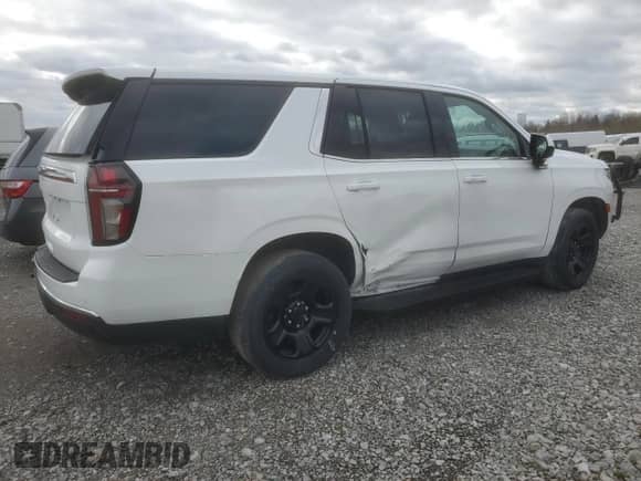 2022 Chevrolet Tahoe Commercial with VIN 1GNSKLED5NR321297, listed as a Copart auction lot 67910044 with 14,755 mi miles and Salvage title. Bid and sale history available at DreamBid. Image 3.