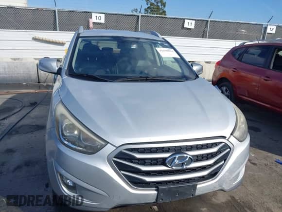 2015 Hyundai Tucson SE with VIN KM8JU3AG7FU963562, listed as a IAAI auction lot 41620894 with 171,382 mi miles and . Bid and sale history available at DreamBid. Image 13.