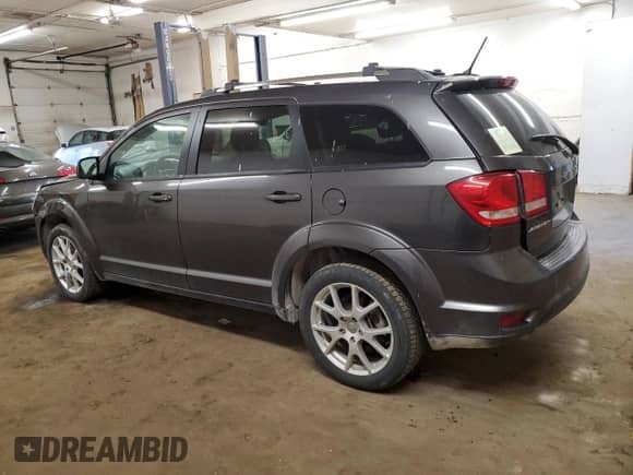 2015 Dodge Journey SXT с VIN 3C4PDCCG9FT722284, выставлен на аукционе Copart как лот 84937724 с пробегом 210 747 миль миль и Списание • Salvage title. История ставок и продаж доступна на DreamBid. Изображение 2.
