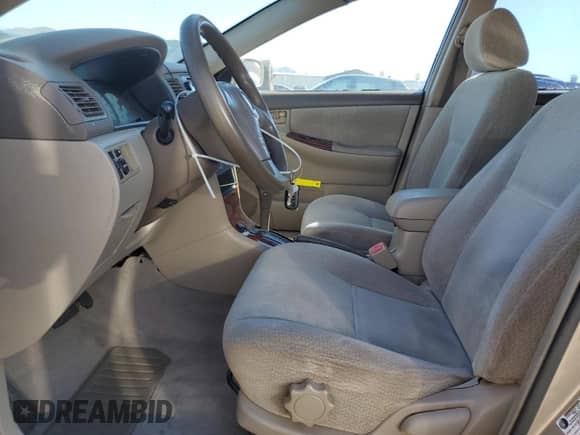 2004 Toyota Corolla CE z VIN 1NXBR32E94Z301126, wystawiony jako Copart lot #87467835 z przebiegiem 181 189 mil mil oraz Szkoda całkowita • Salvage title. Historia ofert i sprzedaży dostępna na DreamBid. Obrazek 7.