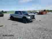 2020 Ram 1500 Rebel z VIN 1C6SRFLT7LN199084, wystawiony jako Copart lot #64990655 z przebiegiem 143 021 mil mil oraz Nie do naprawy • Non repairable. Historia ofert i sprzedaży dostępna na DreamBid. Obrazek 14.