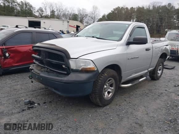 2012 Ram 1500 ST с VIN 3C6JD6AP9CG272920, выставлен на аукционе IAAI как лот 41251604 с пробегом 150 248 миль миль и . История ставок и продаж доступна на DreamBid. Изображение 17.