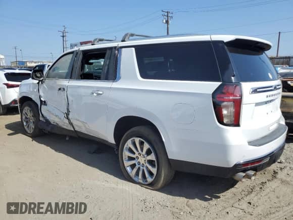 2021 Chevrolet Suburban Premier z VIN 1GNSKFKDXMR185737, wystawiony jako Copart lot #61986155 z przebiegiem 50 759 mil mil oraz Szkoda całkowita • Salvage title. Historia ofert i sprzedaży dostępna na DreamBid. Obrazek 2.
