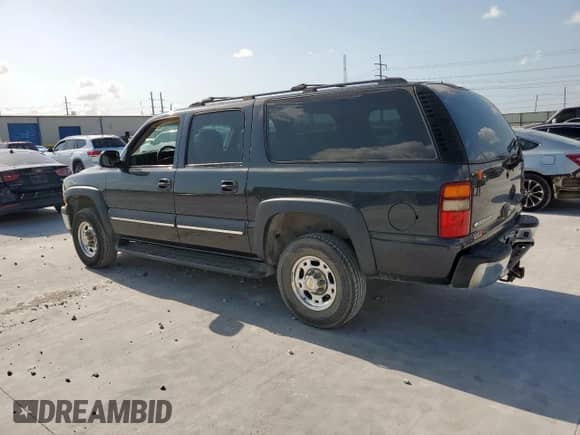 2003 Chevrolet Suburban LT z VIN 3GNGC26UX3G261624, wystawiony jako Copart lot #61983855 z przebiegiem 314 782 mil mil oraz Czysty tytuł • Clean title. Historia ofert i sprzedaży dostępna na DreamBid. Obrazek 2.